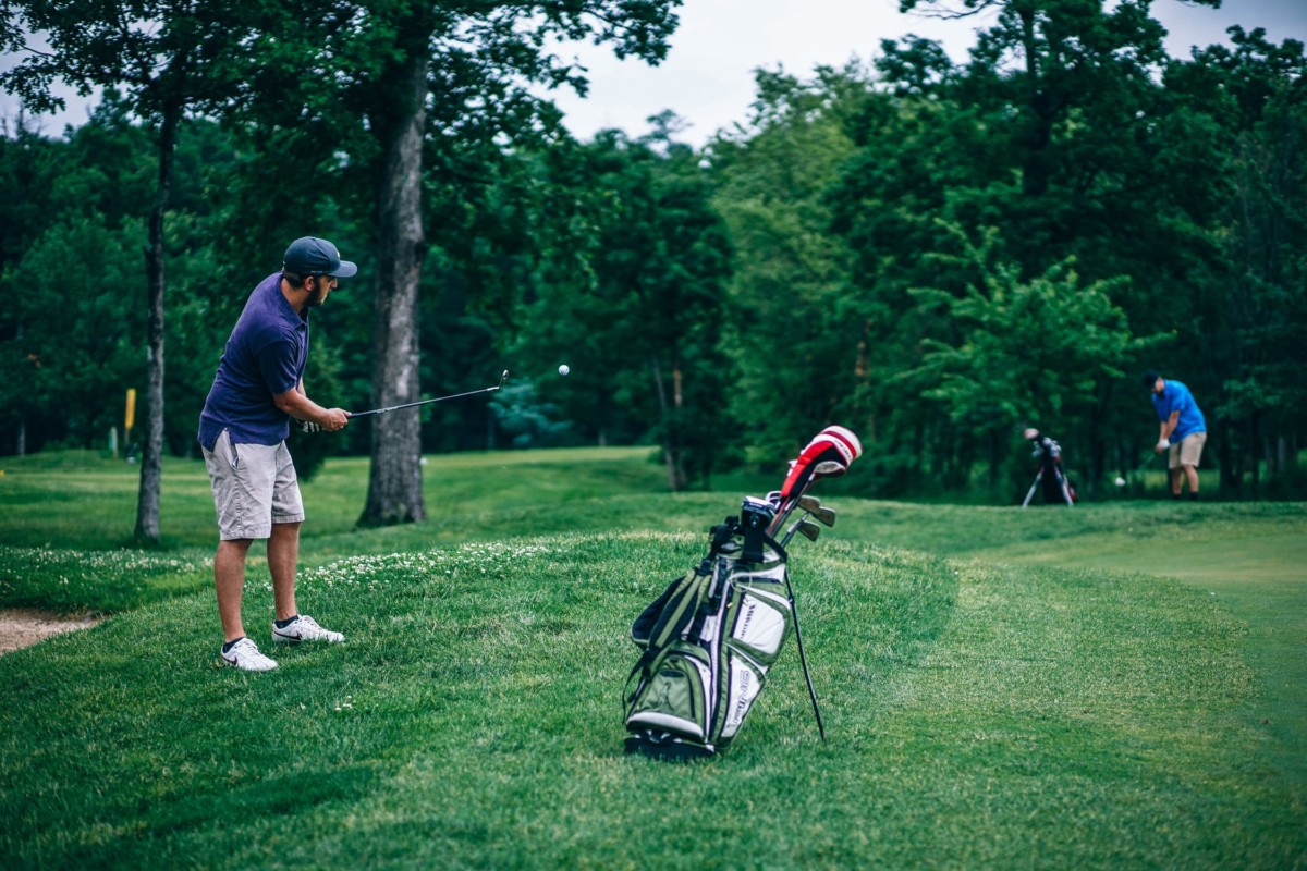 man golfing