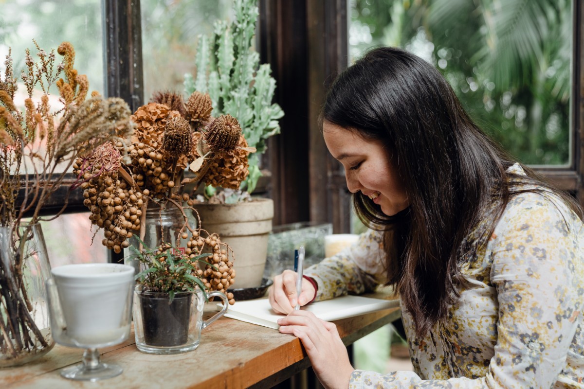 Woman writing a book