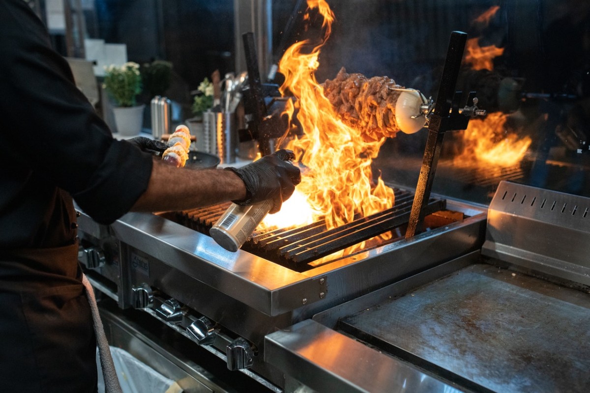 Man cooking food on the grill