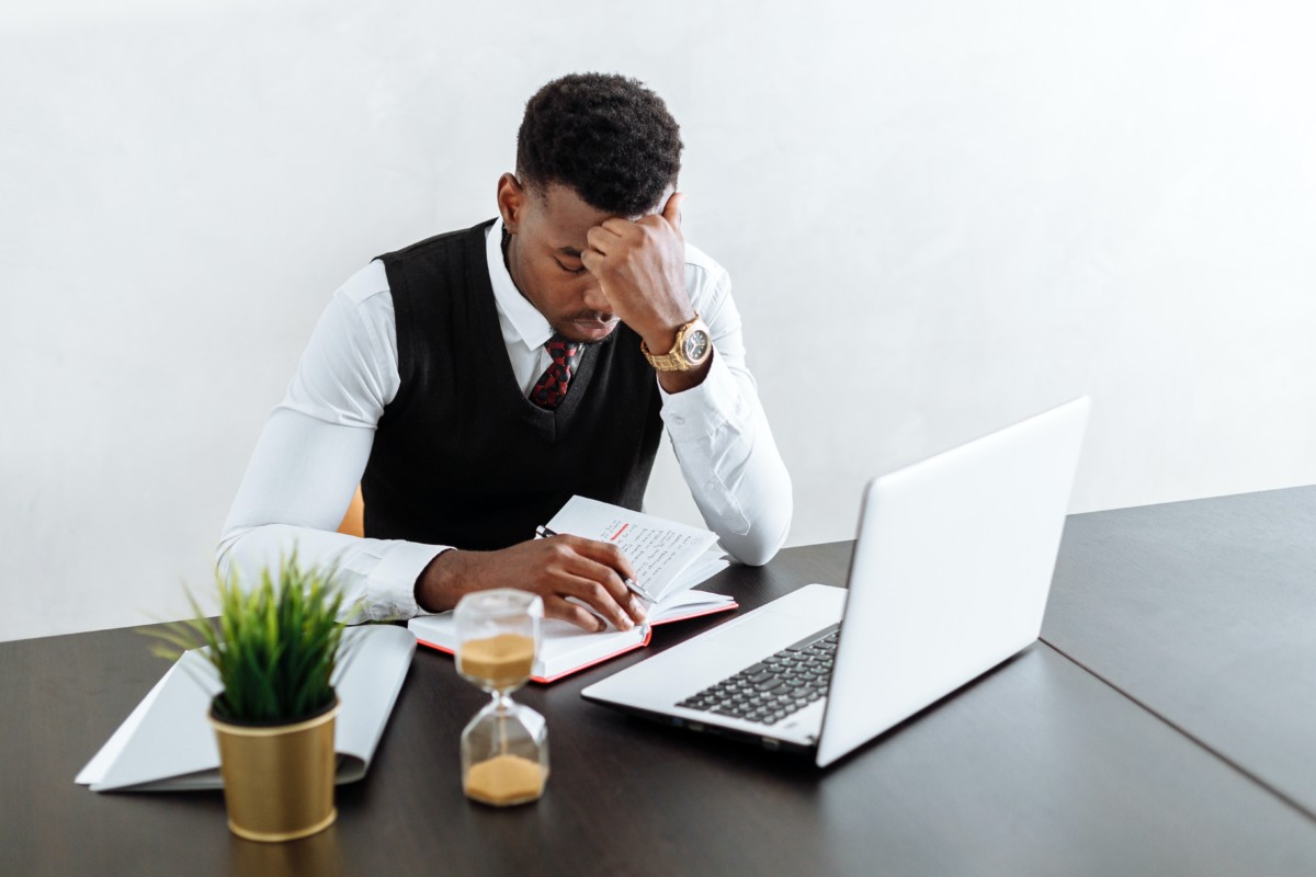 Man stressed from writing