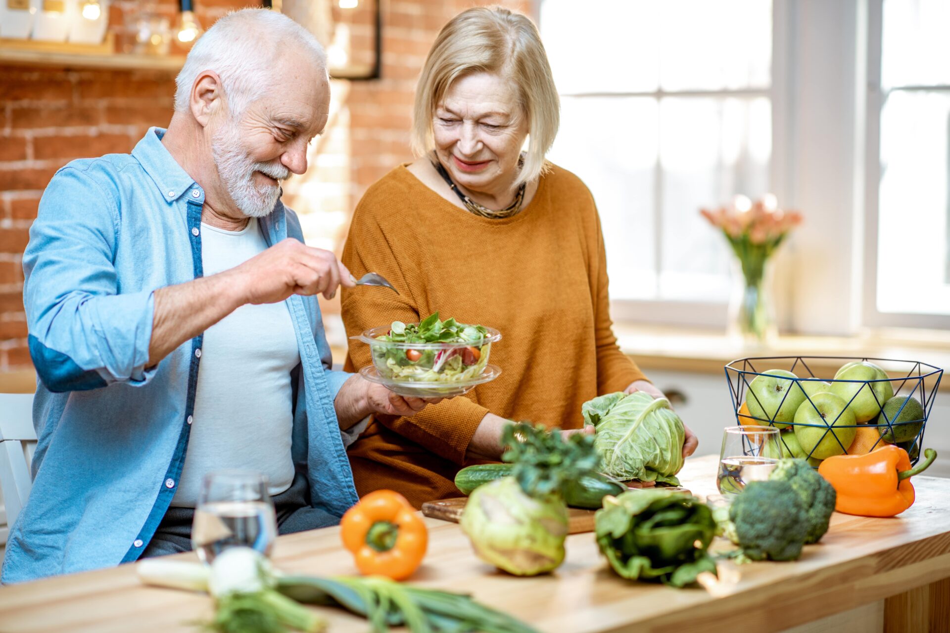 elderly couple eating healthily Ladan Hajipour