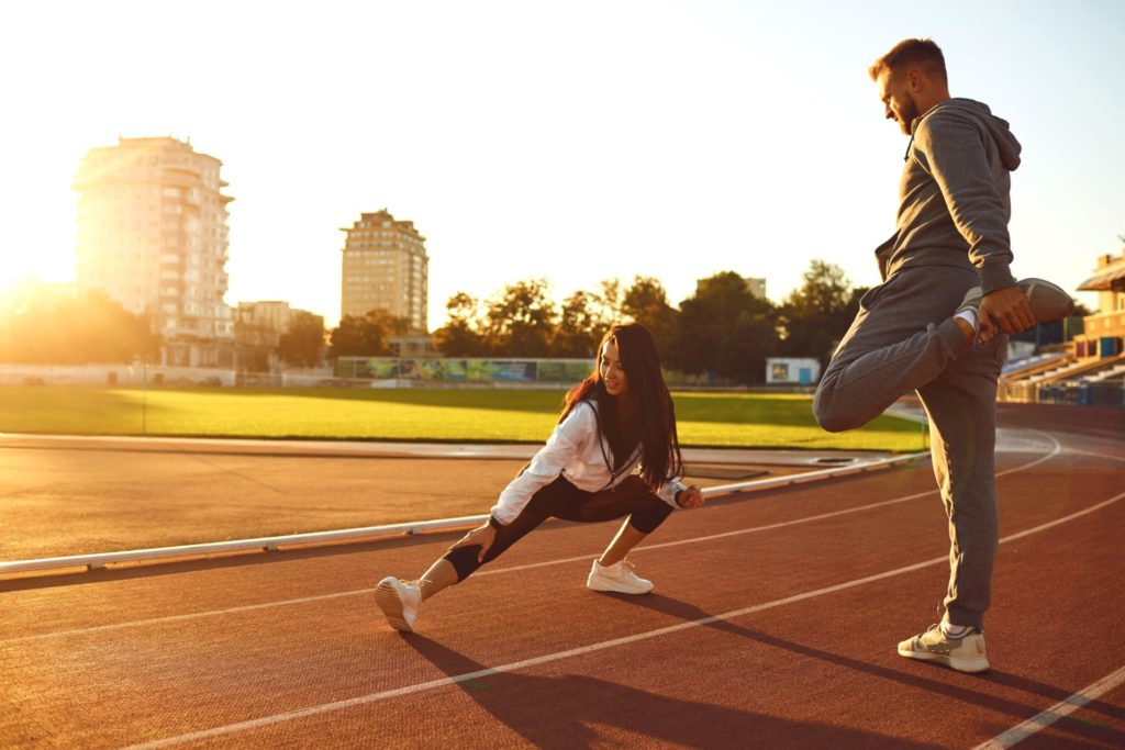 Image of someone warming up with stretches